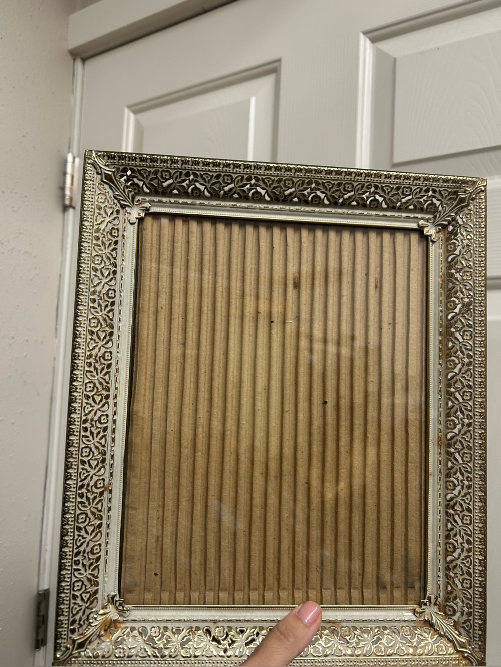 vintage Hollywood Regency-style gold-tone and whitewashed metal picture frame